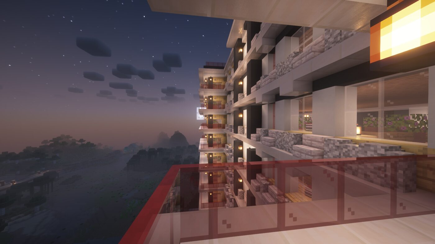 Hasty Apartments exterior at dusk